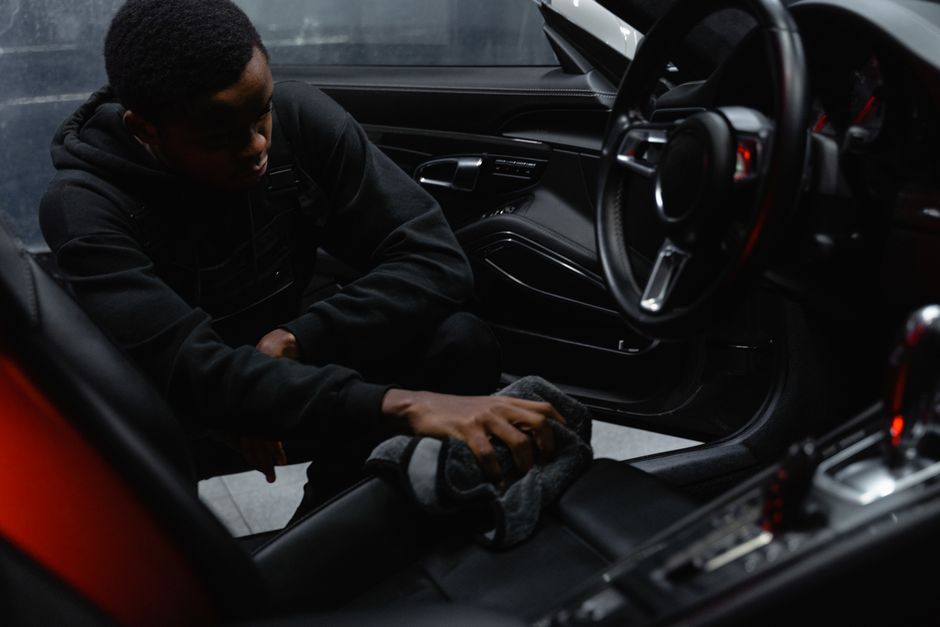 Professional cleaning of car interior leather