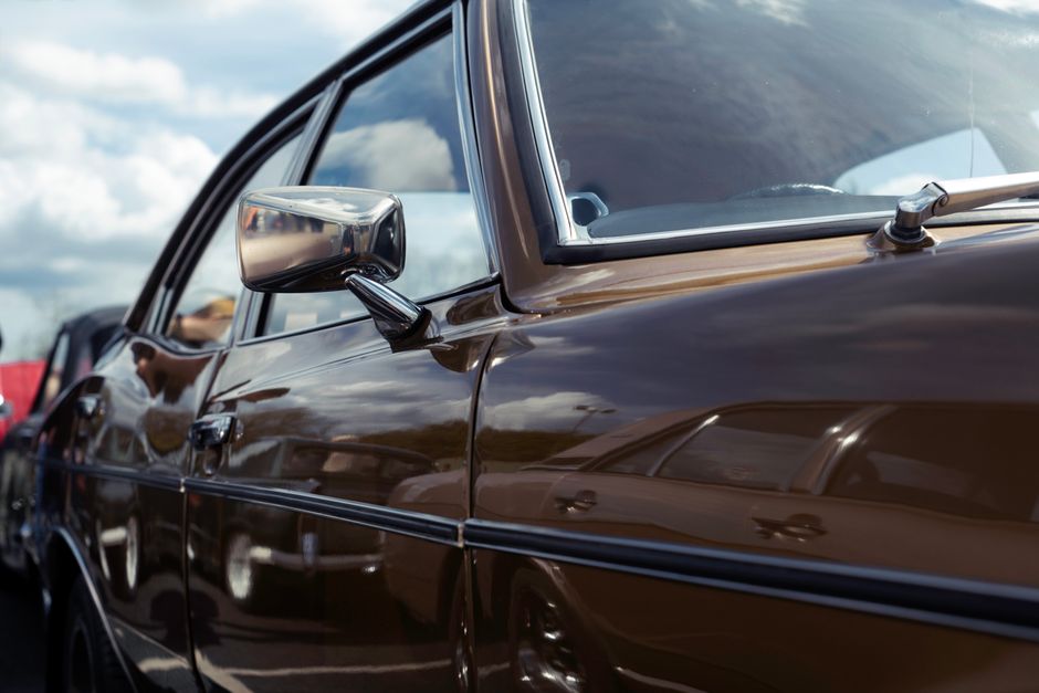 Shiny luxury car exterior after professional auto detailing